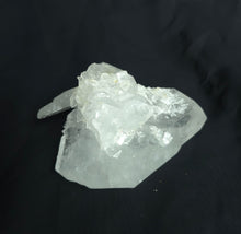 Load image into Gallery viewer, Clear crystal on a black background
